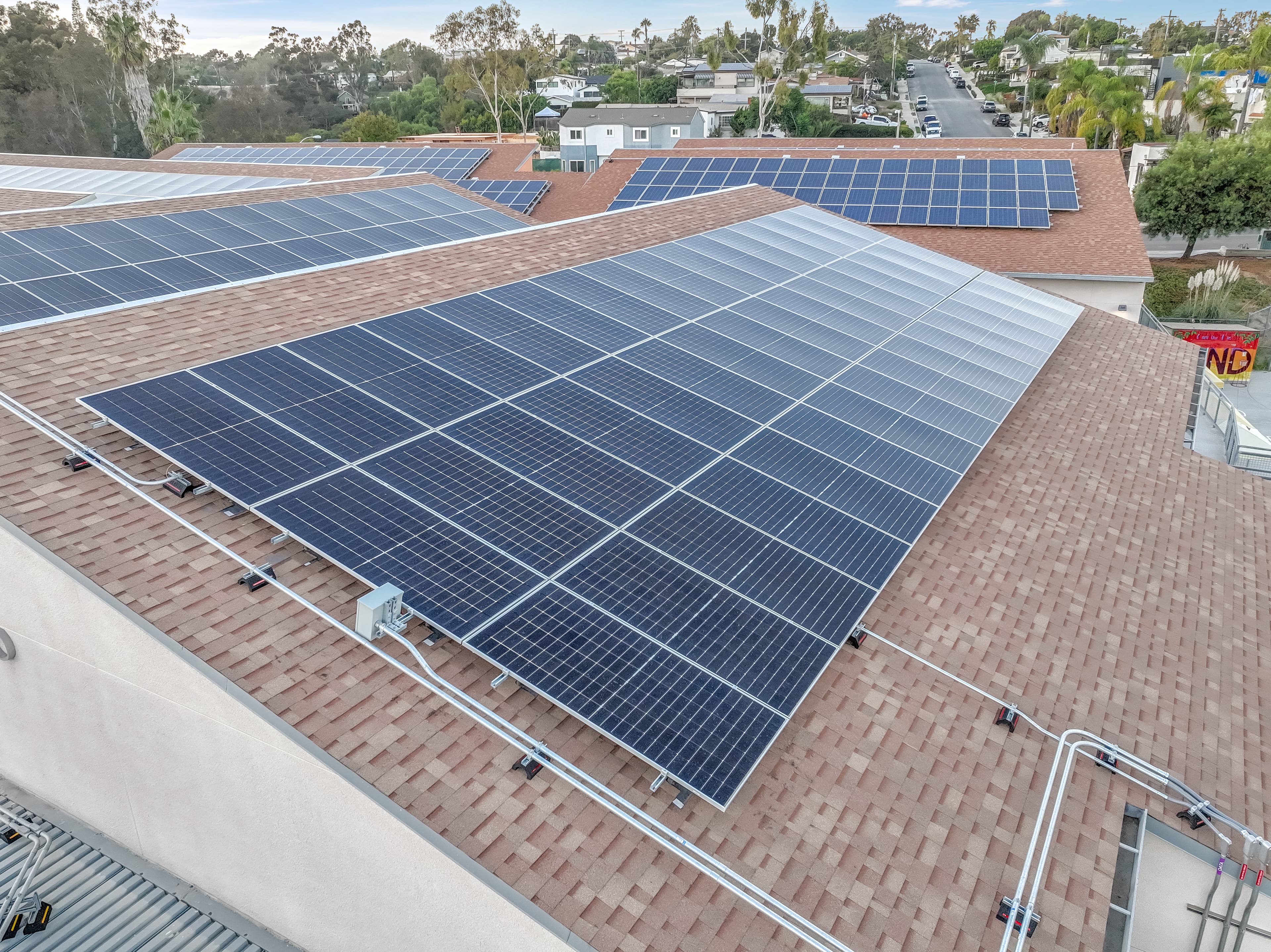 Technician assessing a property for solar and battery installation